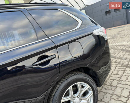 Чорний Міцубісі Аутлендер, об'ємом двигуна 2 л та пробігом 157 тис. км за 15299 $, фото 36 на Automoto.ua