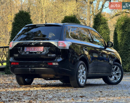 Чорний Міцубісі Аутлендер, об'ємом двигуна 2 л та пробігом 173 тис. км за 15299 $, фото 43 на Automoto.ua