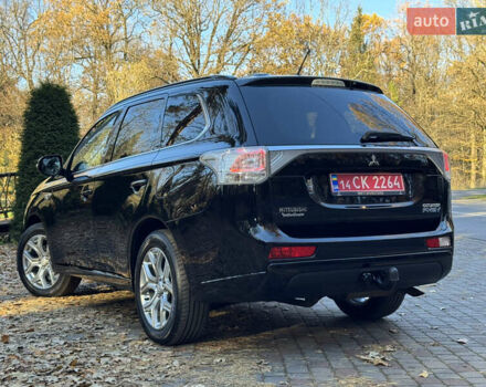 Чорний Міцубісі Аутлендер, об'ємом двигуна 2 л та пробігом 173 тис. км за 15299 $, фото 62 на Automoto.ua