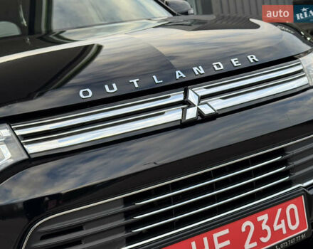 Чорний Міцубісі Аутлендер, об'ємом двигуна 2 л та пробігом 157 тис. км за 15299 $, фото 8 на Automoto.ua