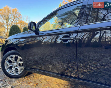 Чорний Міцубісі Аутлендер, об'ємом двигуна 2 л та пробігом 173 тис. км за 15299 $, фото 74 на Automoto.ua