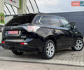 Чорний Міцубісі Аутлендер, об'ємом двигуна 2 л та пробігом 157 тис. км за 15299 $, фото 40 на Automoto.ua