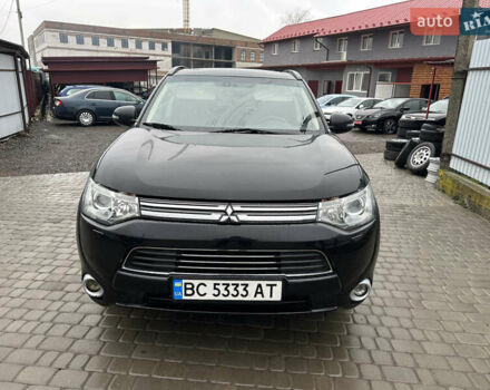 Черный Мицубиси Аутлендер, объемом двигателя 2 л и пробегом 223 тыс. км за 13400 $, фото 1 на Automoto.ua
