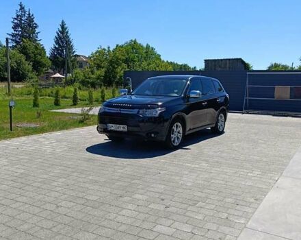 Черный Мицубиси Аутлендер, объемом двигателя 2.42 л и пробегом 148 тыс. км за 13000 $, фото 8 на Automoto.ua