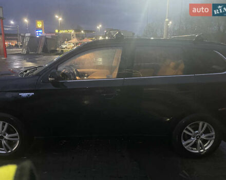 Черный Мицубиси Аутлендер, объемом двигателя 2 л и пробегом 206 тыс. км за 14500 $, фото 8 на Automoto.ua