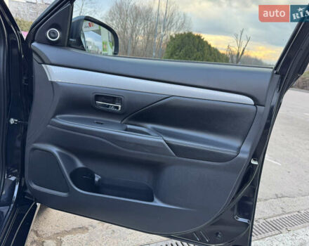 Чорний Міцубісі Аутлендер, об'ємом двигуна 2 л та пробігом 157 тис. км за 15299 $, фото 81 на Automoto.ua