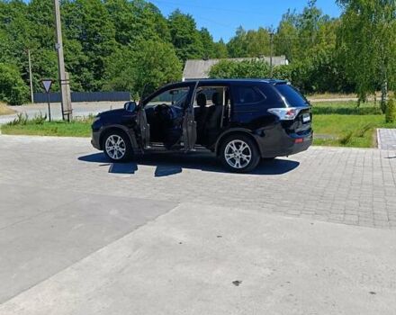 Черный Мицубиси Аутлендер, объемом двигателя 2.42 л и пробегом 148 тыс. км за 13000 $, фото 9 на Automoto.ua