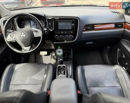 Черный Мицубиси Аутлендер, объемом двигателя 2.4 л и пробегом 231 тыс. км за 12600 $, фото 29 на Automoto.ua