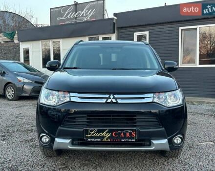 Чорний Міцубісі Аутлендер, об'ємом двигуна 2.4 л та пробігом 199 тис. км за 12800 $, фото 1 на Automoto.ua