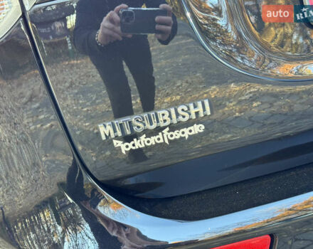 Чорний Міцубісі Аутлендер, об'ємом двигуна 2 л та пробігом 173 тис. км за 15299 $, фото 67 на Automoto.ua