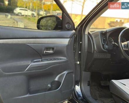 Черный Мицубиси Аутлендер, объемом двигателя 2.4 л и пробегом 270 тыс. км за 12500 $, фото 16 на Automoto.ua