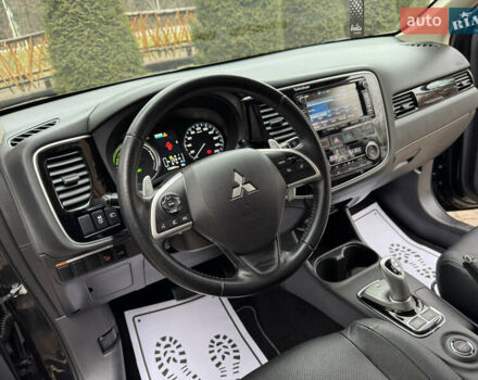 Черный Мицубиси Аутлендер, объемом двигателя 2 л и пробегом 173 тыс. км за 15299 $, фото 72 на Automoto.ua