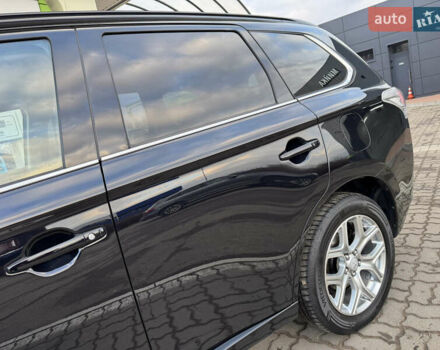 Чорний Міцубісі Аутлендер, об'ємом двигуна 2 л та пробігом 157 тис. км за 15299 $, фото 35 на Automoto.ua