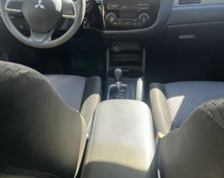 Черный Мицубиси Аутлендер, объемом двигателя 2 л и пробегом 150 тыс. км за 12000 $, фото 3 на Automoto.ua