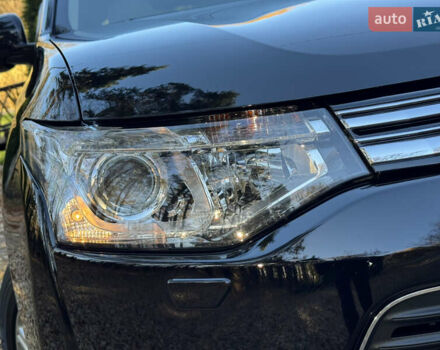 Чорний Міцубісі Аутлендер, об'ємом двигуна 2 л та пробігом 173 тис. км за 15299 $, фото 7 на Automoto.ua