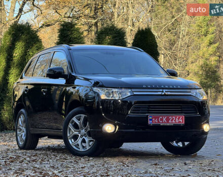 Чорний Міцубісі Аутлендер, об'ємом двигуна 2 л та пробігом 173 тис. км за 15299 $, фото 1 на Automoto.ua