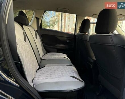 Черный Мицубиси Аутлендер, объемом двигателя 2.4 л и пробегом 270 тыс. км за 12500 $, фото 29 на Automoto.ua