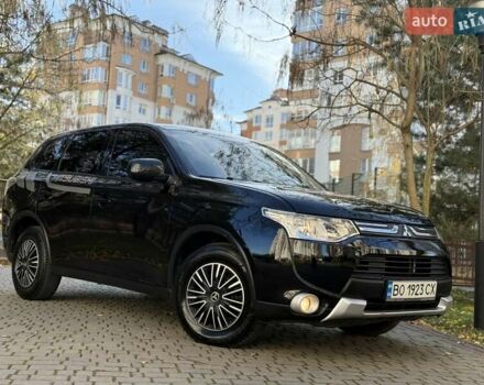 Черный Мицубиси Аутлендер, объемом двигателя 2.4 л и пробегом 270 тыс. км за 12500 $, фото 2 на Automoto.ua