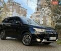 Черный Мицубиси Аутлендер, объемом двигателя 2.4 л и пробегом 270 тыс. км за 12500 $, фото 2 на Automoto.ua
