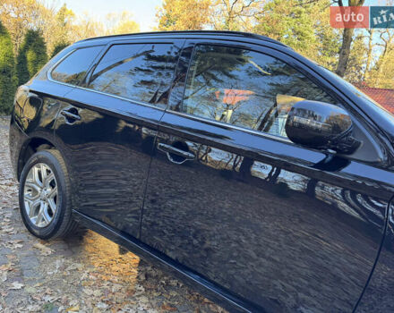 Чорний Міцубісі Аутлендер, об'ємом двигуна 2 л та пробігом 173 тис. км за 15299 $, фото 20 на Automoto.ua