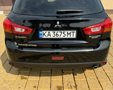 Чорний Міцубісі Аутлендер, об'ємом двигуна 2 л та пробігом 211 тис. км за 9500 $, фото 1 на Automoto.ua