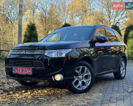 Чорний Міцубісі Аутлендер, об'ємом двигуна 2 л та пробігом 173 тис. км за 15299 $, фото 27 на Automoto.ua