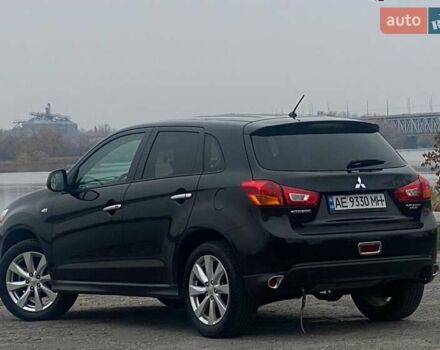 Чорний Міцубісі Аутлендер, об'ємом двигуна 2 л та пробігом 250 тис. км за 10800 $, фото 8 на Automoto.ua