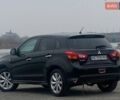 Чорний Міцубісі Аутлендер, об'ємом двигуна 2 л та пробігом 250 тис. км за 10800 $, фото 8 на Automoto.ua