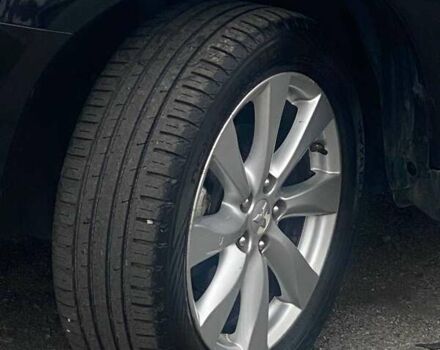 Чорний Міцубісі Аутлендер, об'ємом двигуна 2 л та пробігом 250 тис. км за 10800 $, фото 20 на Automoto.ua