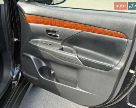 Черный Мицубиси Аутлендер, объемом двигателя 2.4 л и пробегом 231 тыс. км за 12600 $, фото 22 на Automoto.ua