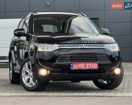 Чорний Міцубісі Аутлендер, об'ємом двигуна 2 л та пробігом 157 тис. км за 15299 $, фото 2 на Automoto.ua