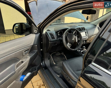Чорний Міцубісі Аутлендер, об'ємом двигуна 2 л та пробігом 211 тис. км за 9500 $, фото 5 на Automoto.ua