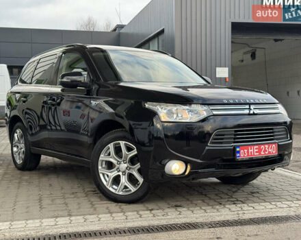 Чорний Міцубісі Аутлендер, об'ємом двигуна 2 л та пробігом 157 тис. км за 15299 $, фото 3 на Automoto.ua