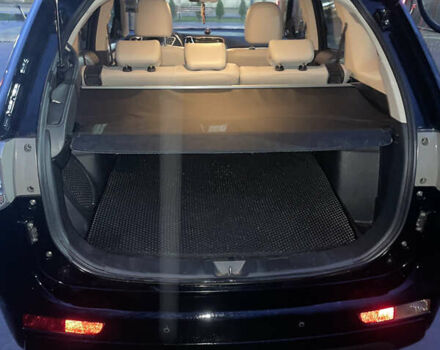 Черный Мицубиси Аутлендер, объемом двигателя 2 л и пробегом 206 тыс. км за 14500 $, фото 6 на Automoto.ua