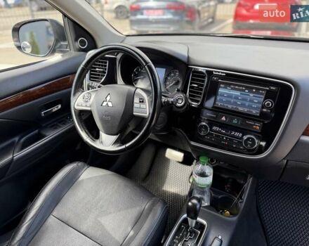 Черный Мицубиси Аутлендер, объемом двигателя 2.4 л и пробегом 231 тыс. км за 12600 $, фото 25 на Automoto.ua