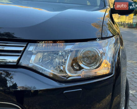 Чорний Міцубісі Аутлендер, об'ємом двигуна 2 л та пробігом 173 тис. км за 15299 $, фото 31 на Automoto.ua