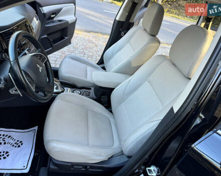 Чорний Міцубісі Аутлендер, об'ємом двигуна 2 л та пробігом 173 тис. км за 15299 $, фото 79 на Automoto.ua