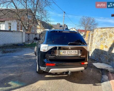 Черный Мицубиси Аутлендер, объемом двигателя 2.4 л и пробегом 183 тыс. км за 15000 $, фото 6 на Automoto.ua
