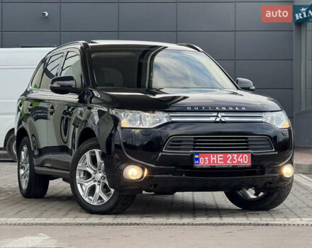 Чорний Міцубісі Аутлендер, об'ємом двигуна 2 л та пробігом 157 тис. км за 15299 $, фото 1 на Automoto.ua