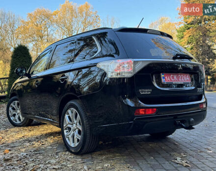 Чорний Міцубісі Аутлендер, об'ємом двигуна 2 л та пробігом 173 тис. км за 15299 $, фото 69 на Automoto.ua