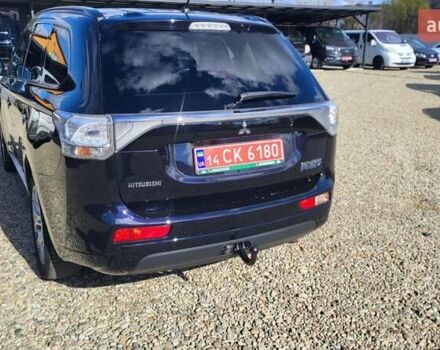 Чорний Міцубісі Аутлендер, об'ємом двигуна 2 л та пробігом 237 тис. км за 13800 $, фото 4 на Automoto.ua
