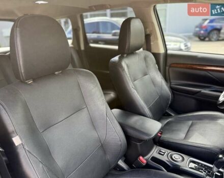 Черный Мицубиси Аутлендер, объемом двигателя 2.4 л и пробегом 231 тыс. км за 12600 $, фото 26 на Automoto.ua