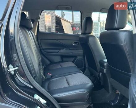 Чорний Міцубісі Аутлендер, об'ємом двигуна 2.4 л та пробігом 199 тис. км за 12800 $, фото 28 на Automoto.ua