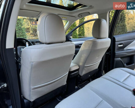 Чорний Міцубісі Аутлендер, об'ємом двигуна 2 л та пробігом 173 тис. км за 15299 $, фото 109 на Automoto.ua