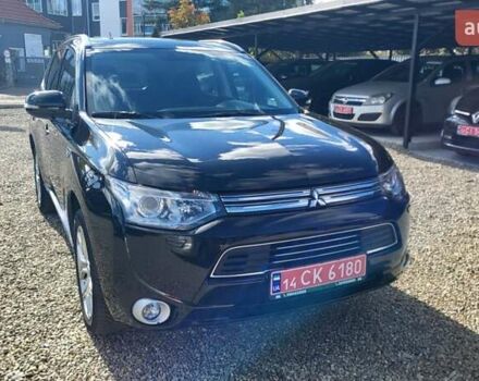Чорний Міцубісі Аутлендер, об'ємом двигуна 2 л та пробігом 237 тис. км за 13800 $, фото 10 на Automoto.ua