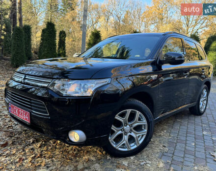 Чорний Міцубісі Аутлендер, об'ємом двигуна 2 л та пробігом 173 тис. км за 15299 $, фото 30 на Automoto.ua