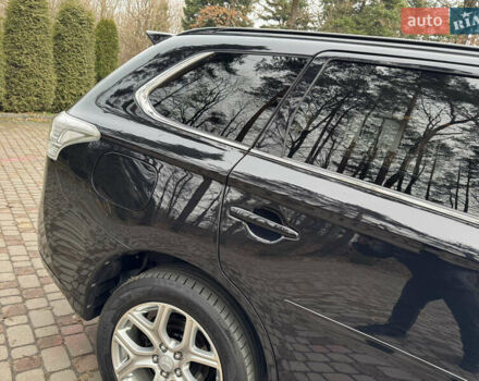 Черный Мицубиси Аутлендер, объемом двигателя 2 л и пробегом 173 тыс. км за 15299 $, фото 16 на Automoto.ua