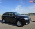 Черный Мицубиси Аутлендер, объемом двигателя 2 л и пробегом 230 тыс. км за 14399 $, фото 1 на Automoto.ua