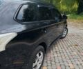 Чорний Міцубісі Аутлендер, об'ємом двигуна 2.36 л та пробігом 275 тис. км за 11700 $, фото 6 на Automoto.ua