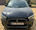 Чорний Міцубісі Аутлендер, об'ємом двигуна 2 л та пробігом 211 тис. км за 9500 $, фото 1 на Automoto.ua